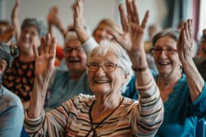 Older adults and children work together on a colorful art project around a shared table.